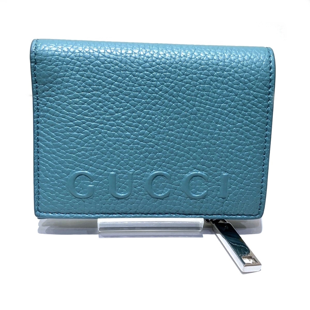 Gucci embossed logo bi-fold wallet, leather, 835076